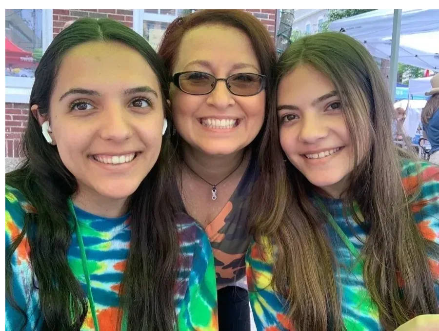 Elika with Youth Infusion program participants at a community event